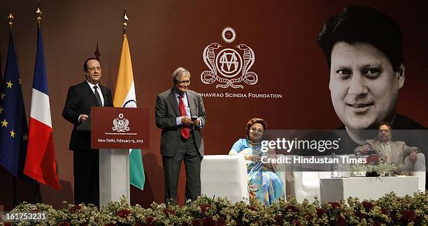 French President Francois Hollande before honoring Amartya Sen with Commandeur de la Legion d' Honneur as wife of late Madhavrao Scindia, Madhavi...