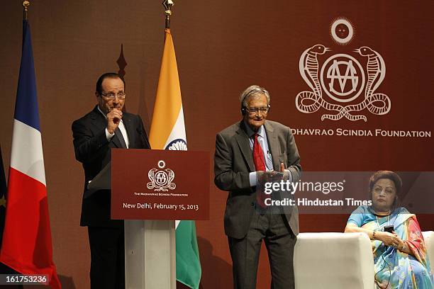 French President Francois Hollande before honoring Amartya Sen with Commandeur de la Legion d' Honneur as wife of late Madhavrao Scindia, Madhavi...