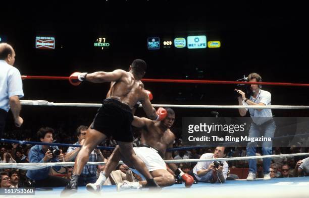 Mike Tyson lands a punch to Reggie Gross during the fight at Madison Square Garden in New York, New York. Mike Tyson won by a TKO 1.