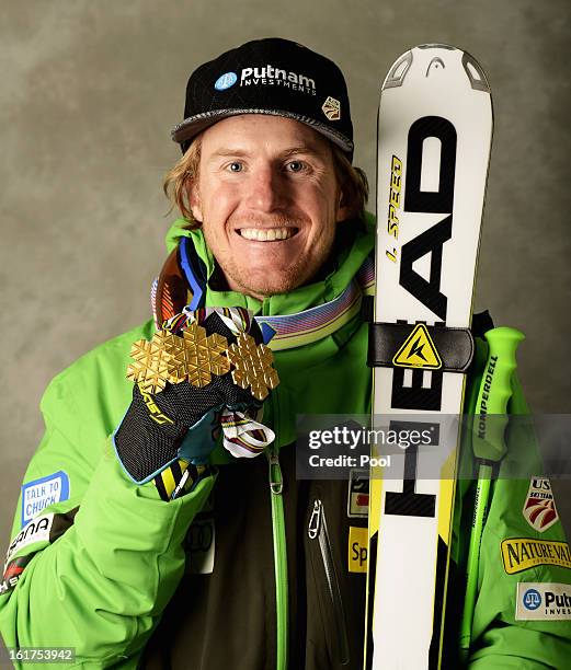 Ted Ligety of the United States of America celebrates with his gold medals for winning the Men's Giant Slalom, Men's Super Combined and Men's Super G...