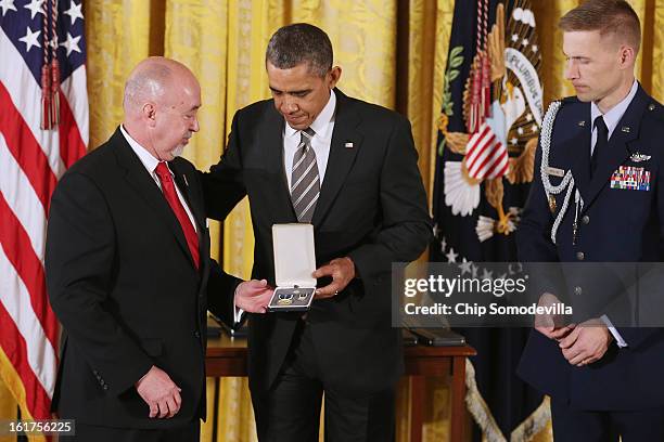 President Barack Obama presents Military Missions in Action founder Michael Dorman with the 2012 Presidential Citizens Medal, the nation's...