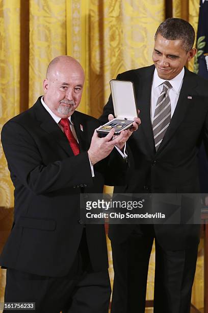 President Barack Obama presents Military Missions in Action founder Michael Dorman with the 2012 Presidential Citizens Medal, the nation's...