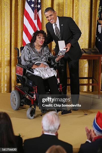 President Barack Obama presents Women Embracing Abilities Now founder Janice Yvette Jackson with the 2012 Presidential Citizens Medal, the nation's...