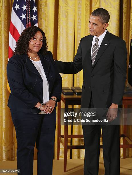 President Barack Obama presents Youth Becoming Healthy founder Pamela Green Jackson with the 2012 Presidential Citizens Medal, the nation's...