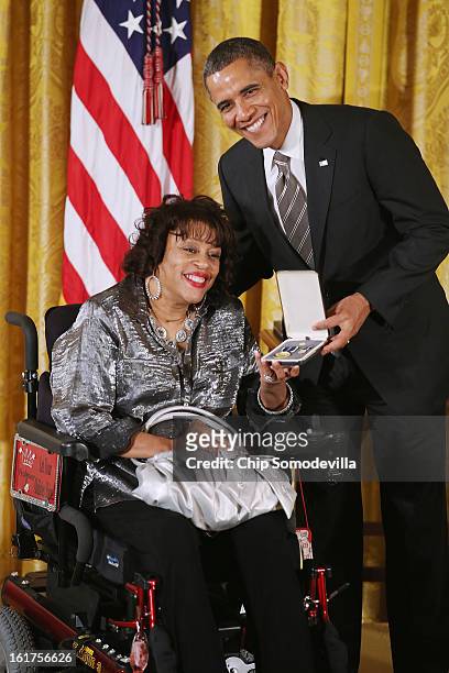 President Barack Obama presents Women Embracing Abilities Now founder Janice Yvette Jackson with the 2012 Presidential Citizens Medal, the nation's...