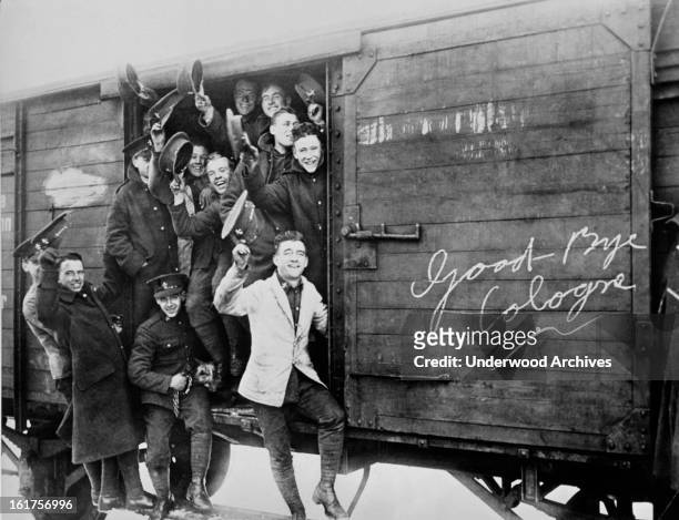 Members of the British Army of Occupation rejoice at leaving Cologne in a boxcar after the signing of the Locarno Pact in Switzerland, Cologne,...