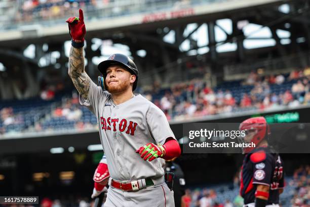 Alex Verdugo of the Boston Red Sox reacts after hitting a one run home run against the Washington Nationals during the first inning at Nationals Park...