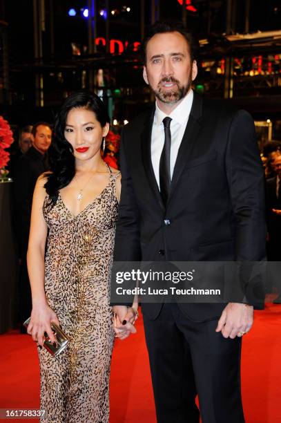 Nicolas Cage and wife Alice Kim attend the 'The Croods' Premiere during the 63rd Berlinale International Film Festival at Berlinale Palast on...