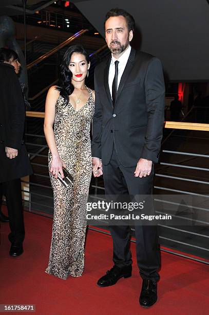 Actor Nicolas Cage and wife Alice Kim attend 'The Croods' Premiere during the 63rd Berlinale International Film Festival at Berlinale Palast on...