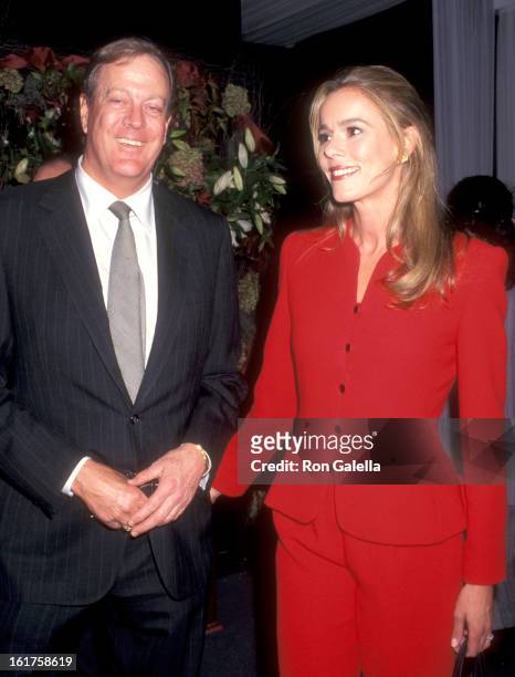Businessman David H. Koch and wife Julia Flesher attend the International Fine Art and Antique Dealers Show on October 10, 1996 at Seventh Regiment...