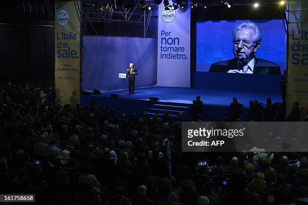Italy's outgoing Prime Minister Mario Monti delivers a speech during a rally of the centrist electoral coalition 'With Monti for Italy' on February...