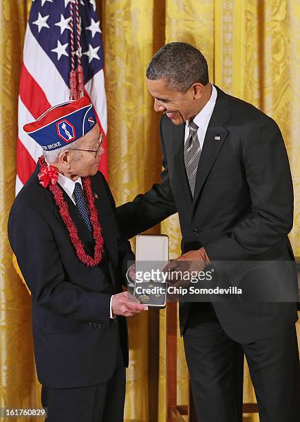President Barack Obama presents Japanese American Veterans Association Executive Director Terry Shima with the 2012 Presidential Citizens Medal, the...