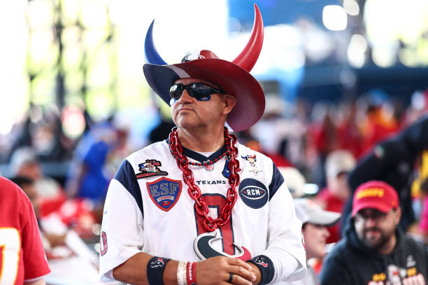 Houston Texans fan stands in the crowd during Day 3 of the 2023 NFL Draft at Union Station on April 29, 2023 in Kansas City, Missouri.