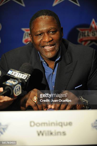 Legend Dominique Wilkins speaks with reporters during media availability as part of the 2013 NBA All-Star Weekend at the Hilton Americas Hotel on...