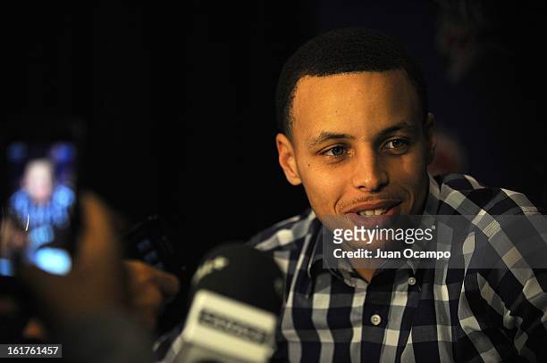 Stephen Curry of the Golden State Warriors speaks with reporters during media availability as part of the 2013 NBA All-Star Weekend at the Hilton...