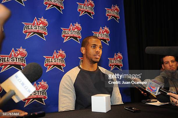 Chris Paul of the Los Angeles Clippers speaks with reporters during media availability as part of the 2013 NBA All-Star Weekend at the Hilton...