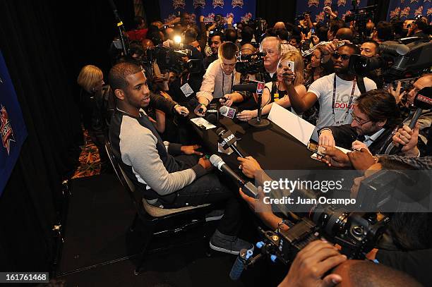 Chris Paul of the Los Angeles Clippers speaks with reporters during media availability as part of the 2013 NBA All-Star Weekend at the Hilton...