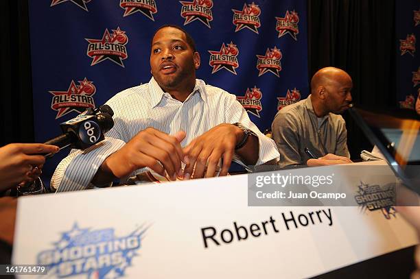 Former NBA Players Robert Horry and Sam Cassell speak with reporters during media availability as part of the 2013 NBA All-Star Weekend at the Hilton...