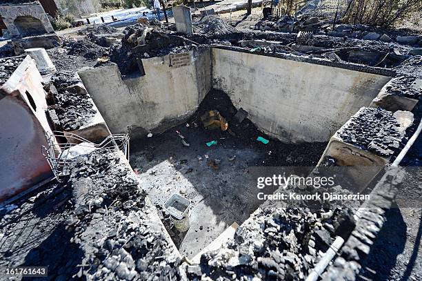 The cellar of a burned out cabin where the remains of multiple murder suspect and former Los Angeles Police Department officer Christopher Dorner...