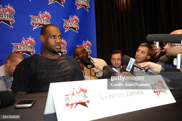 LeBron James of the Miami Heat speaks with reporters during media availability as part of the 2013 NBA All-Star Weekend at the Hilton Americas Hotel...