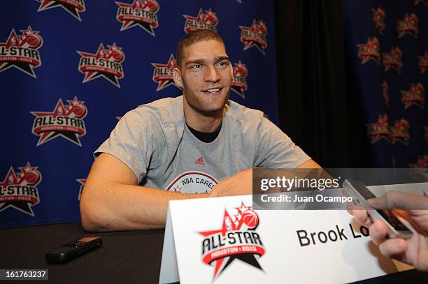 Brook Lopez of the New Jersey Nets speaks with reporters during media availability as part of the 2013 NBA All-Star Weekend at the Hilton Americas...