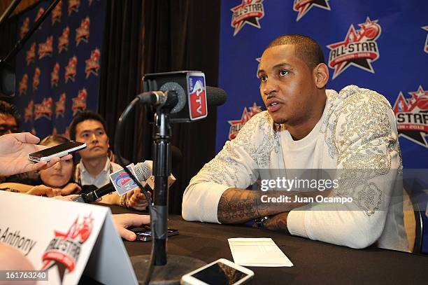 Carmelo Anthony of the New York Knicks speaks with reporters during media availability as part of the 2013 NBA All-Star Weekend at the Hilton...