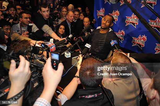 LeBron James of the Miami Heat speaks with reporters during media availability as part of the 2013 NBA All-Star Weekend at the Hilton Americas Hotel...