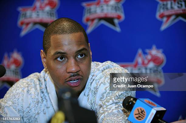 Carmelo Anthony of the New York Knicks speaks with reporters during media availability as part of the 2013 NBA All-Star Weekend at the Hilton...