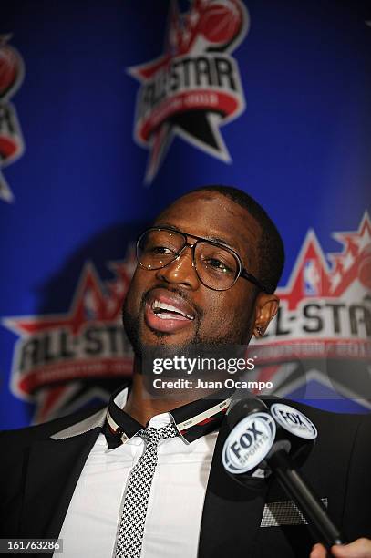 Dwyane Wade of the Miami Heat speaks with reporters during media availability as part of the 2013 NBA All-Star Weekend at the Hilton Americas Hotel...