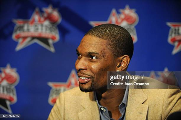 Chris Bosh of the Miami Heat speaks with reporters during media availability as part of the 2013 NBA All-Star Weekend at the Hilton Americas Hotel on...