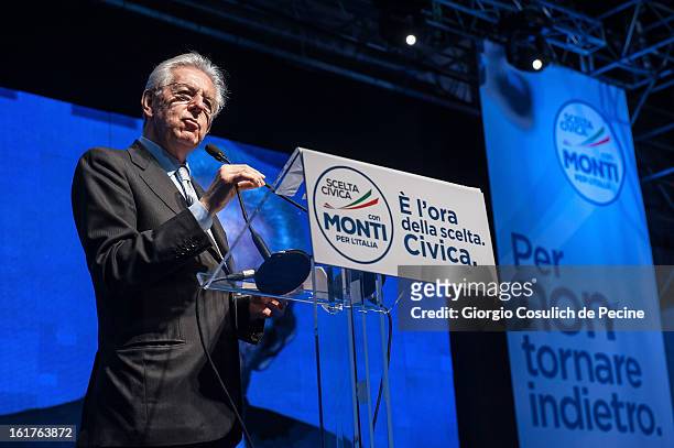 Outgoing Italian Prime Minister Mario Monti delivers a speech during a campaign rally for his centrist alliance 'With Monit For Italy' and the 'Civic...