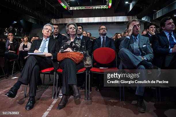 Outgoing Italian Prime Minister Mario Monti , his wife Elsa Antonioli and President of Ferrari Luca Cordero di Montezemolo attend a campaign rally...