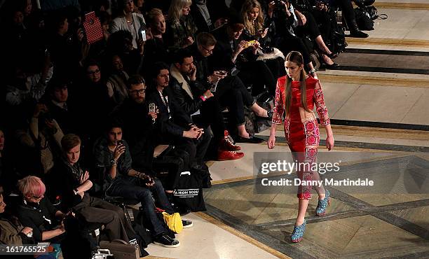 Model walks the runway at the Nova Chiu show during London Fashion Week Fall/Winter 2013/14 at Freemasons Hall on February 15, 2013 in London,...