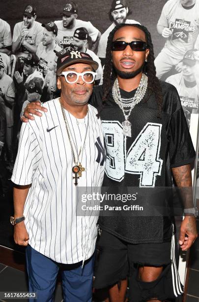 Spike Lee and Quavo attend the game between the Atlanta Braves and the New York Yankees at Truist Park on August 15, 2023 in Atlanta, Georgia.