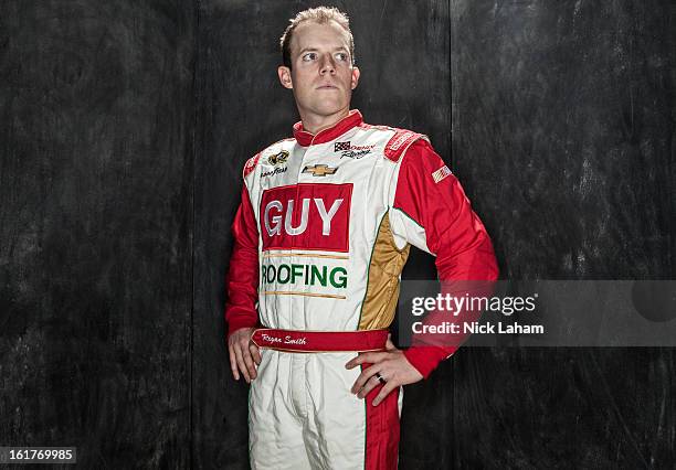 Driver Regan Smith poses during portraits for the 2013 NASCAR Sprint Cup Series at Daytona International Speedway on February 14, 2013 in Daytona...