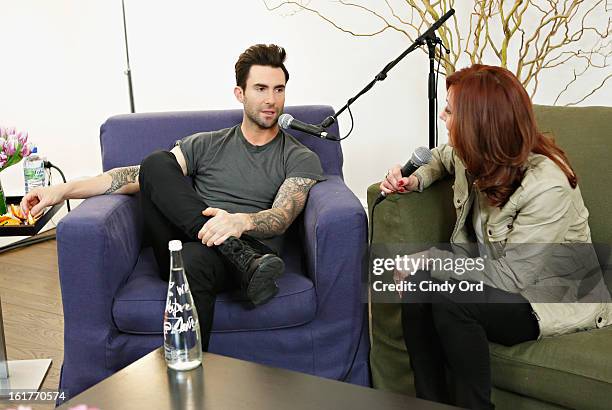 Singer Adam Levine is interviewed exclusively by Danielle Monaro of "Elvis Duran and the Morning Show" at The Mercer Hotel on February 15, 2013 in...