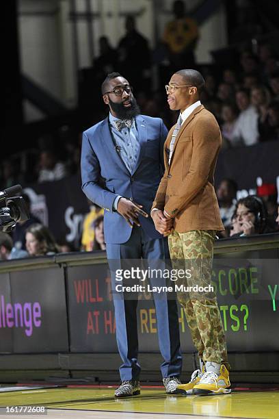 Russell Westbrook of the East team and James Harden of the West team talk during the Sprint Celebrity Game at Jam Session during NBA All Star Weekend...