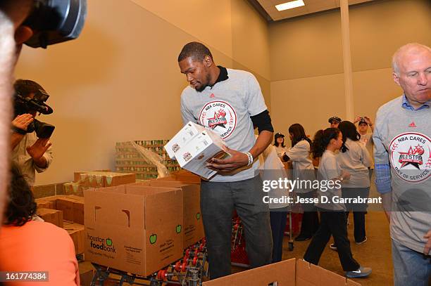 Kevin Durant of the Oklahoma City Thunder participates at the 2013 NBA Cares Day of Service at the Food Bank on February 15, 2013 in Houston, Texas....