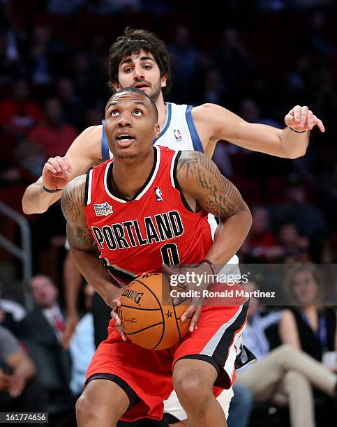 Damian Lillard of the Portland Trail Blazers and Team Shaq looks to shoot in front of Ricky Rubio of the Minnesota Timberwolves and Team Chuck in the...