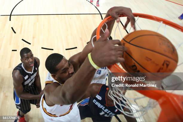 Tristan Thompson of the Cleveland Cavaliers and Team Chuck dunks the ball over Michael Kidd-Gilchrist of the Charlotte Bobcats and Team Shaq in the...