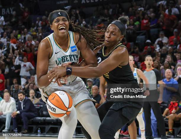 Chelsea Gray of the Las Vegas Aces knocks the ball away from Jonquel Jones of the New York Liberty in the second quarter of the 2023 Commissioner's...