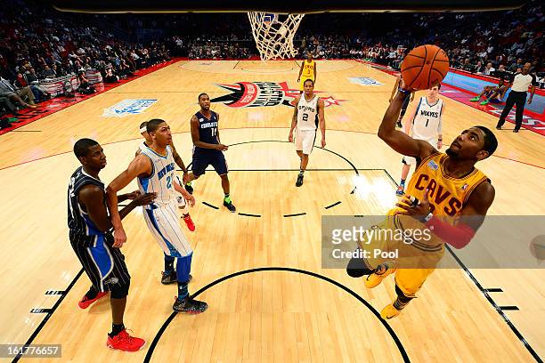 Kyrie Irving of the Cleveland Cavaliers and Team Shaq shoots the ball in the lane in the BBVA Rising Stars Challenge 2013 part of the 2013 NBA...
