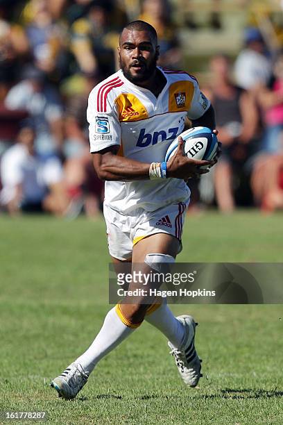 Patrick Osborne of the Chiefs runs the ball during the Super Rugby trial match between the Hurricanes and the Chiefs at Mangatainoka RFC on February...
