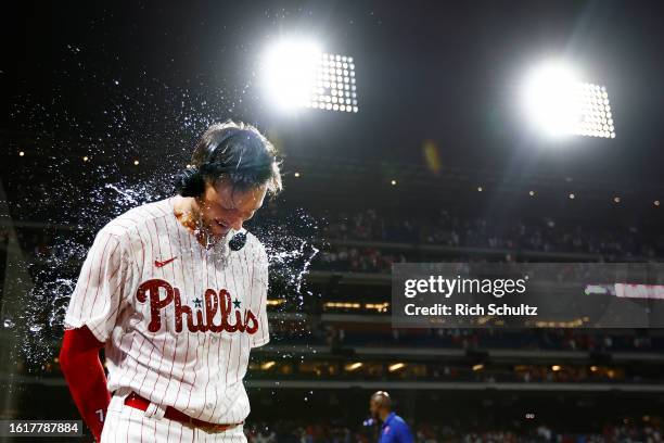 Trea Turner is sprayed with water after he hit a two-run walk off single to defeat the San Francisco Giants 4-3 in the ninth inning of a game at...