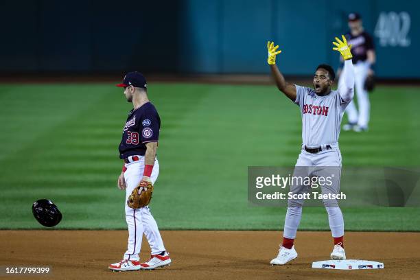 Pablo Reyes of the Boston Red Sox celebrates after hitting a double against the Washington Nationals during the fourth inning at Nationals Park on...