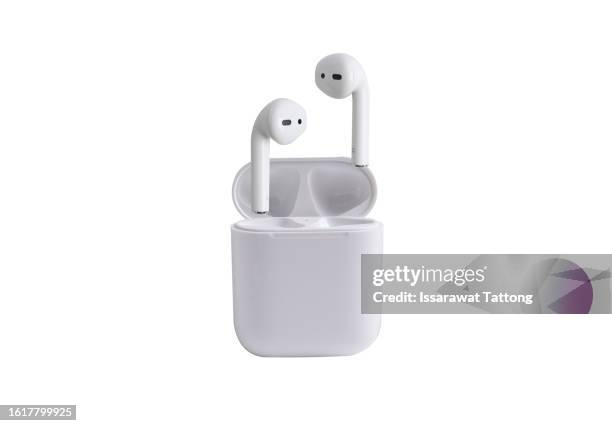 chonburi, thailand - august 13, 2023: white wireless headphones apple airpods gen2, on white background. - phone with case ears stock pictures, royalty-free photos & images