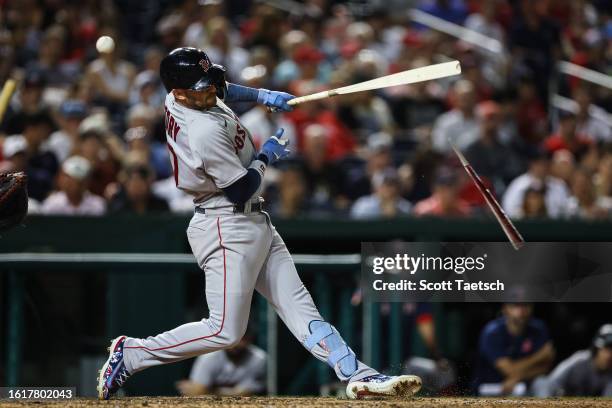 Trevor Story of the Boston Red Sox breaks his bat against the Washington Nationals during the eighth inning at Nationals Park on August 15, 2023 in...