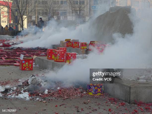 Fireworks explode for good fortune on February 16, 2013 in Shenyang, Liaoning Province of China. Local businesses in China rushed to set off...