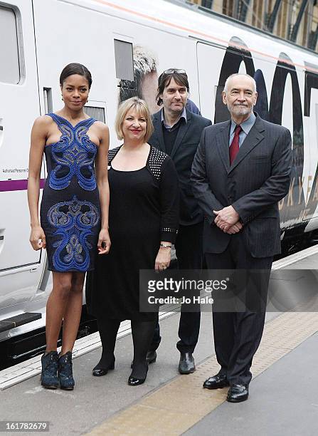 Naomie Harris, Barbara Broccoli, Neal Purvis and Michael Gregg Wilson attend a photocall to unveil the new Skyfall Train at Kings Cross Station on...