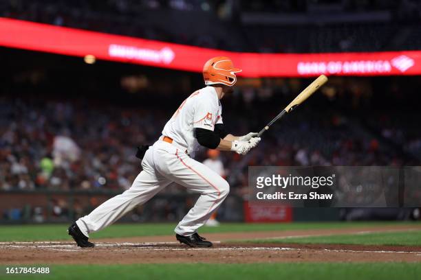 Wade Meckler of the San Francisco Giants hits a single for his first Major League hit in the sixth inning of their game against the Tampa Bay Rays at...